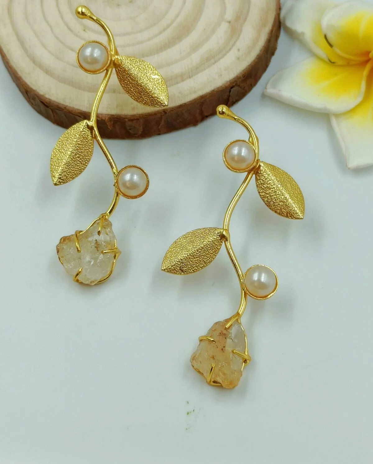 Gold Plated Wavy Designer Dangler Earrings with Semi Precious Stone Studded