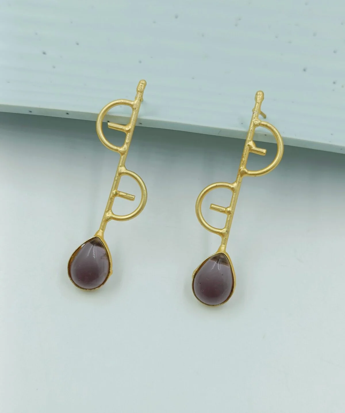 Gold Plated Purple Stone Studded Designer Dangler Earrings