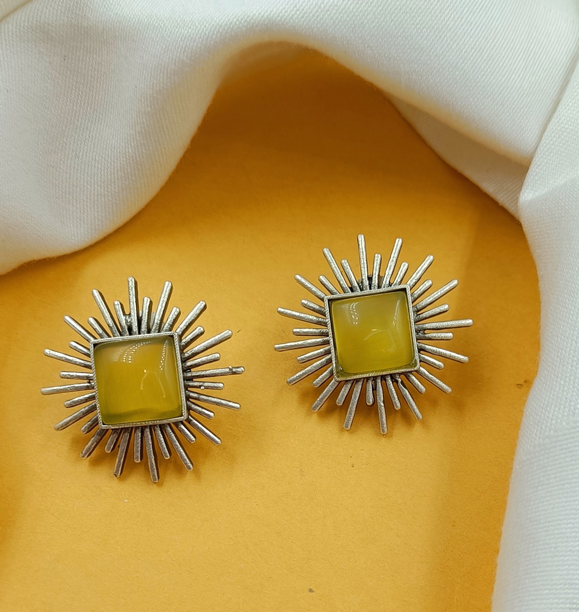Silver Plated Brass Yellow Stone Studded Ray Earrings