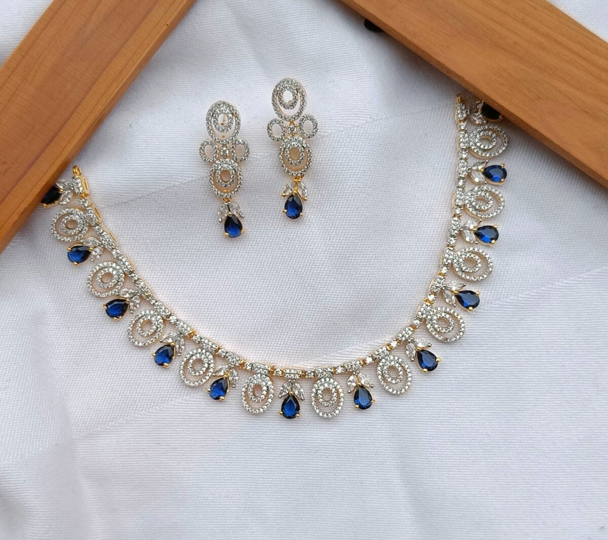 Rhodium Gold Plated Circular Blue Stone Designer Necklace Set