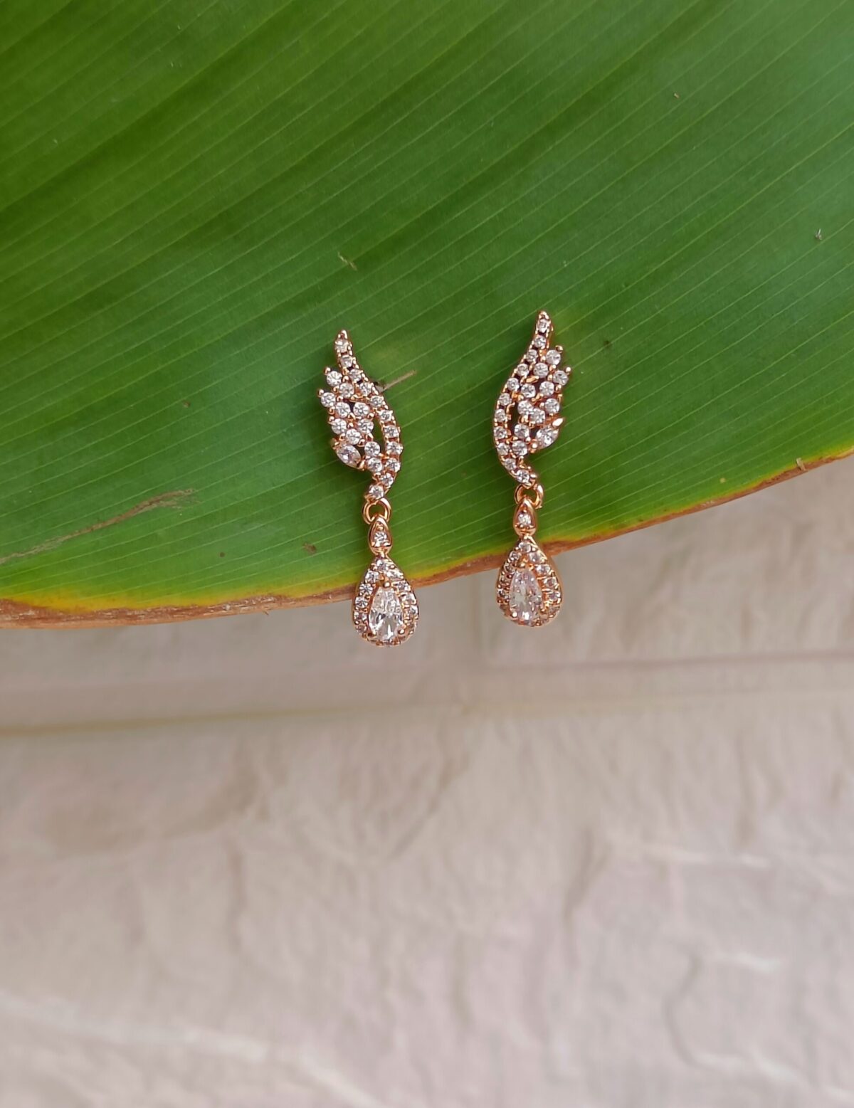 FHF Rose Gold Plated American Diamond Feather Designer Earrings