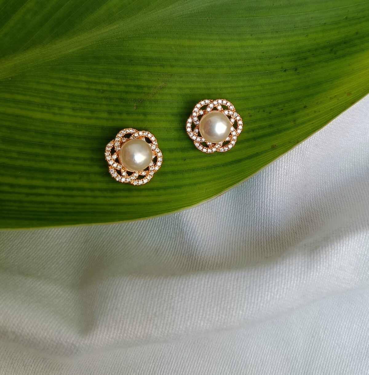 FHF Rose Gold Plated American Diamond Flower Shaped Designer Pearl Studs Earrings